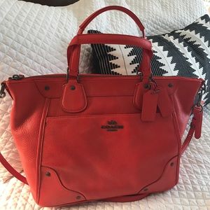 Coach bag in orange leather. NWOT